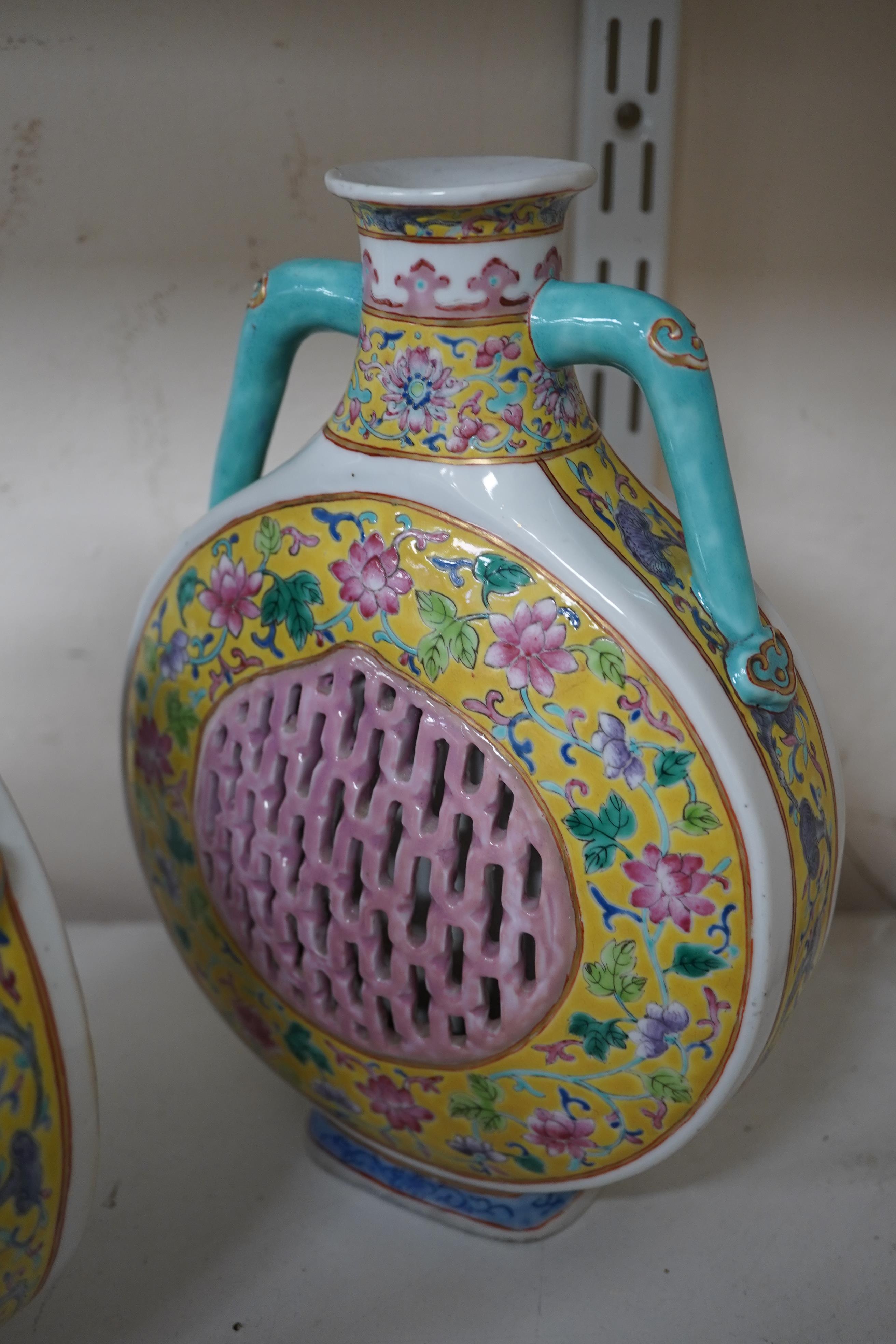 A pair of Chinese yellow ground double-walled moonflasks, bianhu, Daoguang marks, 19th century
